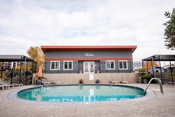 The pool is in front of the clubhouse at the resort